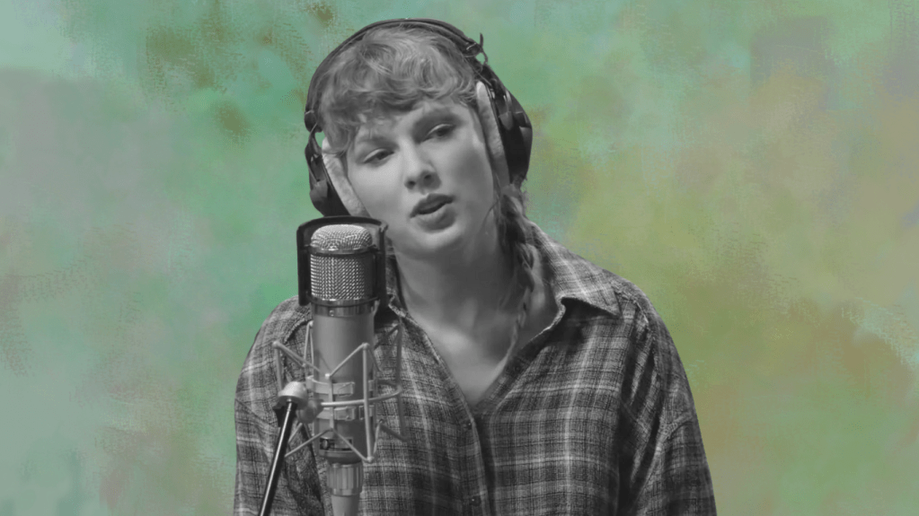 Taylor Swift talking into a podcast mic